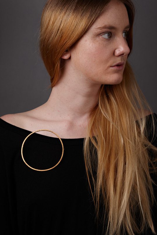 Sun Brooch On Model - News