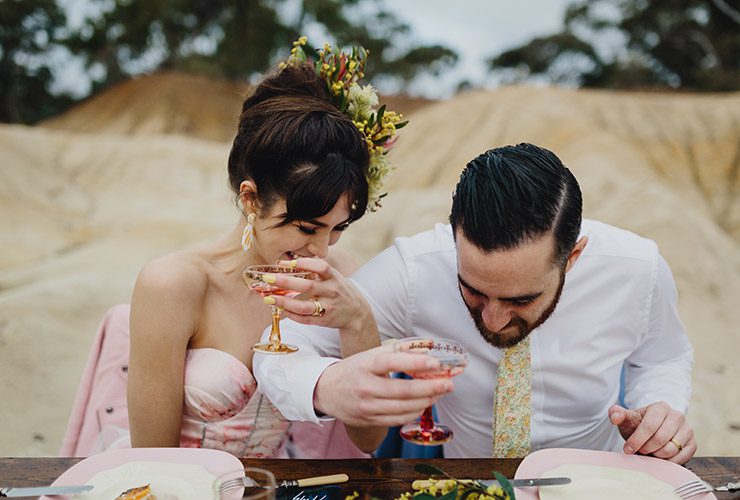 Drinking pink champagne at Amy & Nick's wedding shoot